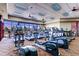 Modern gym equipped with treadmills and elliptical machines, offering panoramic views for an energizing workout at 2384 Yellow Bird Ct, North Las Vegas, NV 89084