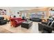 Spacious living room with tile flooring, neutral paint, and large windows, offering bright space at 2384 Yellow Bird Ct, North Las Vegas, NV 89084