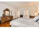 Charming main bedroom features wood floors, neutral walls, and stylish decor at 2384 Yellow Bird Ct, North Las Vegas, NV 89084