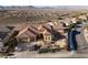 Inviting single-story home with desert landscaping in front, paired with attached two-car garage at 2401 Orangeburg Pl, Henderson, NV 89044