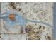 This two-story home is located on a large desert lot with an impressive circular driveway at 2590 Luke St, Pahrump, NV 89060