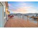 Spacious wooden deck showcases mountain views and outdoor dining with chairs and tables at 2590 Luke St, Pahrump, NV 89060
