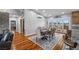 Elegant dining room with hardwood floors, stylish lighting, and access to an outdoor patio, ideal for hosting gatherings at 2590 Luke St, Pahrump, NV 89060