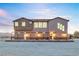 Beautiful two-story home with stone accents and a welcoming pergola at 2590 Luke St, Pahrump, NV 89060
