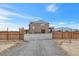 Gated property featuring a spacious yard and a large two-story home at 2590 Luke St, Pahrump, NV 89060
