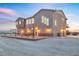Stunning home featuring unique window designs and multiple garage spaces at 2590 Luke St, Pahrump, NV 89060