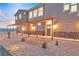 Charming front entrance with a covered walkway and landscaped yard at 2590 Luke St, Pahrump, NV 89060