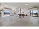 Expansive garage featuring multiple doors, high ceilings, and an abundance of natural light at 2590 Luke St, Pahrump, NV 89060