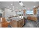 Bright, open kitchen with wooden cabinets, granite counters, and mountain views at 2590 Luke St, Pahrump, NV 89060