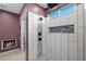 Bathroom shower with a full shower system, and designer tile including a mosaic inlay at 2590 Luke St, Pahrump, NV 89060