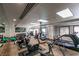 Well-equipped gym featuring modern machines, weights and mirrors, perfect for fitness enthusiasts at 30 Strada Di Villaggio # 521, Henderson, NV 89011