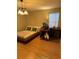 Bedroom with wood floor, desk, and natural light at 3160 Del Dotto Walk, Henderson, NV 89044