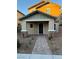Charming home featuring a welcoming front porch and a paved walkway leading to the entrance at 3160 Del Dotto Walk, Henderson, NV 89044