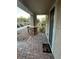 Inviting front porch area with a brick pathway, decorative plants, and a welcoming 'Home' doormat at 3160 Del Dotto Walk, Henderson, NV 89044
