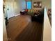 Cozy living room with hardwood floors and comfortable seating at 3160 Del Dotto Walk, Henderson, NV 89044