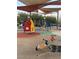 Colorful playground features modern equipment and a shaded seating area for residents and families at 3160 Del Dotto Walk, Henderson, NV 89044