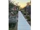 View down the sidewalk in a well maintained community at 3160 Del Dotto Walk, Henderson, NV 89044