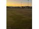 Dusk view of the soccer field provides a serene space for recreation and sports activities at 3160 Del Dotto Walk, Henderson, NV 89044
