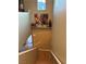 Stairway leading to landing with artwork and view of the front door at 3160 Del Dotto Walk, Henderson, NV 89044
