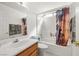 Bathroom with a combination shower and tub, vanity sink and tile flooring at 320 Cimmarron Pl, Pahrump, NV 89048