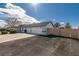 Lovely single-story home boasts a three-car garage with an extra wide driveway at 320 Cimmarron Pl, Pahrump, NV 89048