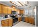 The kitchen has stainless steel appliances, recessed lighting and plenty of counter space at 320 Cimmarron Pl, Pahrump, NV 89048