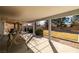 Inviting covered patio with a swing, perfect for relaxing and enjoying the outdoors at 320 Cimmarron Pl, Pahrump, NV 89048
