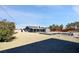 Expansive backyard with a sparkling pool and comfortable lounge seating at 3675 W Maule Ave, Las Vegas, NV 89118
