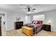 Bedroom with a ceiling fan, two dressers and a decorative quilt on the bed at 3675 W Maule Ave, Las Vegas, NV 89118
