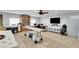 Spacious bonus room features storage, ceiling fan, tiled floors, and large work space at 3675 W Maule Ave, Las Vegas, NV 89118