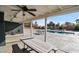 Covered patio area with outdoor seating overlooking a refreshing pool at 3675 W Maule Ave, Las Vegas, NV 89118