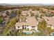 Stunning aerial view of a home with a pool surrounded by lush landscaping at 3863 Glasgow Green Dr, Las Vegas, NV 89141