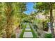 Idyllic backyard walkway and garden, perfect for relaxation and outdoor enjoyment at 3863 Glasgow Green Dr, Las Vegas, NV 89141
