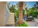 Backyard patio with an outdoor fireplace and plenty of space for outdoor lounging at 3863 Glasgow Green Dr, Las Vegas, NV 89141