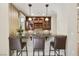 Elegant bar area featuring granite countertop and wood cabinets at 3863 Glasgow Green Dr, Las Vegas, NV 89141