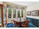 Bright dining room with large windows and classic furnishings at 3863 Glasgow Green Dr, Las Vegas, NV 89141