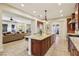 Open-concept kitchen flowing into the living space with a large island at 3863 Glasgow Green Dr, Las Vegas, NV 89141