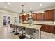 Spacious kitchen with a large island, granite countertops, and stainless steel appliances at 3863 Glasgow Green Dr, Las Vegas, NV 89141