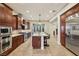 Modern kitchen with granite countertops, stainless steel appliances, and ample cabinet space at 3863 Glasgow Green Dr, Las Vegas, NV 89141