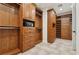 Spacious walk-in closet with custom shelves, drawers, and ample storage space at 3863 Glasgow Green Dr, Las Vegas, NV 89141