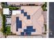 Aerial view of home with solar panels, outdoor kitchen, dining area, putting green, and outdoor seating at 3929 Reyes Ave, Las Vegas, NV 89141