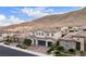 Beautiful home showcasing a well-maintained yard, modern garage door, and a welcoming entrance at 3929 Reyes Ave, Las Vegas, NV 89141