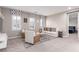 Spacious living room featuring neutral tones, comfortable seating, and stylish decor at 3929 Reyes Ave, Las Vegas, NV 89141