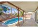 Covered patio overlooks this refreshing pool, offering an ideal setting for outdoor enjoyment at 3963 Redwood St, Las Vegas, NV 89103