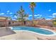 Private backyard with pool, mature trees and a covered patio area at 3963 Redwood St, Las Vegas, NV 89103