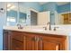 Bathroom featuring double sinks and cabinetry at 4208 Lower Saxon Ave, North Las Vegas, NV 89085