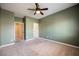 Bedroom features carpet, ceiling fan, paint and doorways at 4208 Lower Saxon Ave, North Las Vegas, NV 89085