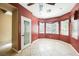 Bright breakfast nook with large windows, tiled floors, and recessed lighting at 4208 Lower Saxon Ave, North Las Vegas, NV 89085