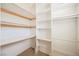 Walk-in closet with shelving and hanging rods for optimal storage at 4208 Lower Saxon Ave, North Las Vegas, NV 89085