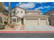 Charming two-story home with a three-car garage and inviting curb appeal at 4208 Lower Saxon Ave, North Las Vegas, NV 89085